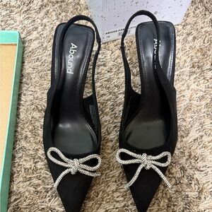 Abound Black Pointed Slingback Heels with Rhinestone Bow